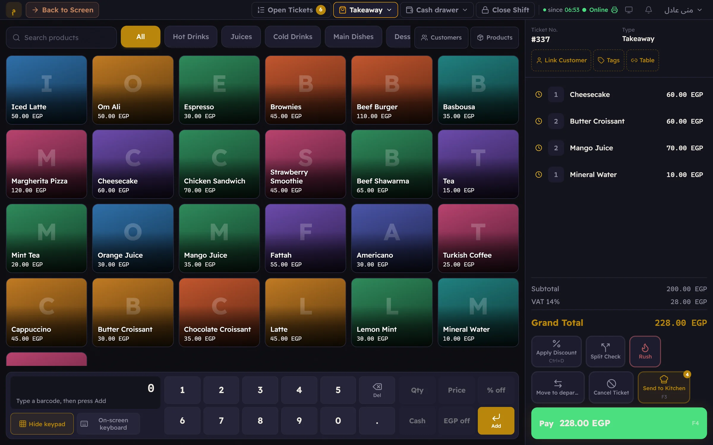 The Major sell screen in dark mode: a ticket with mango juice, croissants, cheesecake and mineral water beside the colourful product grid.